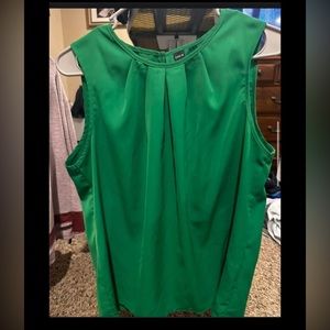 Green sleeveless blouse